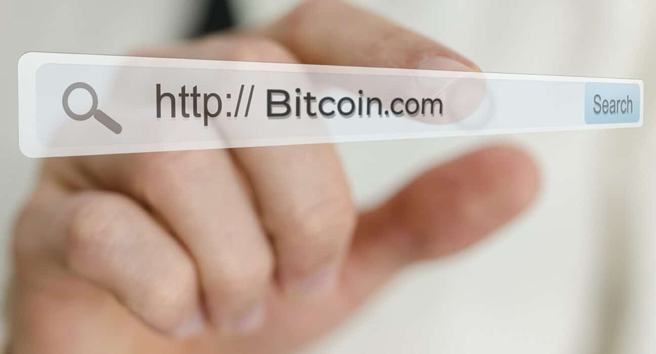 Screenshot of Bitcoin.com domain listing with GoDaddy branding.