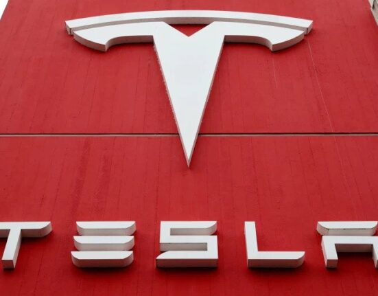 Tesla's Stock Decouples from Major Tech Firms Ahead of Earnings, Bitcoin Volatility Takes a Toll